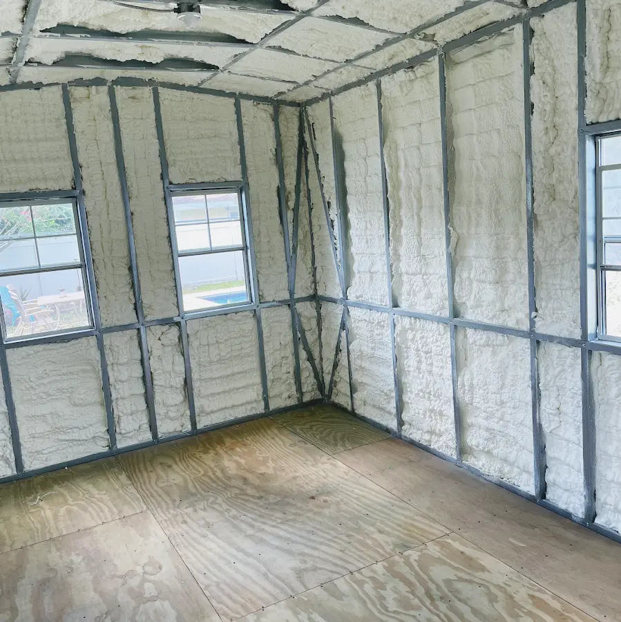 Closed-cell spray foam insulation applied to wall cavities in a residential project in Harrisonburg
